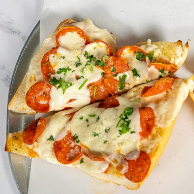 Garlic Bread w/ Mozzarella and Pepperoni.